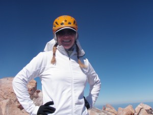 Shannon Wilkinson Posing on the Summit of Mt. Shasta