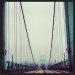 St. Johns Bridge with Forest Park enshrouded in fog