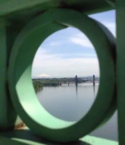 Mt. Hood and the Burlington Rail Bridge are perfectly framed from the St. Johns Bridge, Portland, Oregon