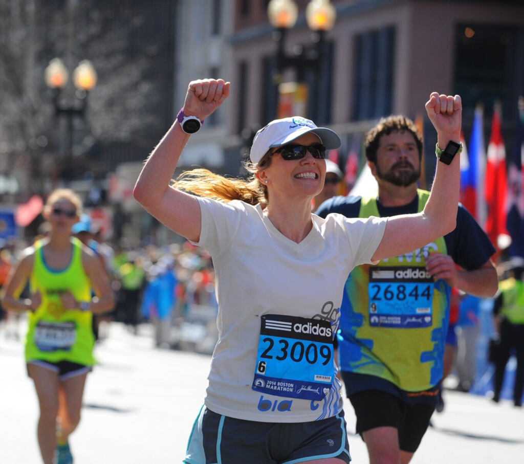 Shannon Wilkinson crosses the finish line of the 118th Boston Marathon - April 21, 2014